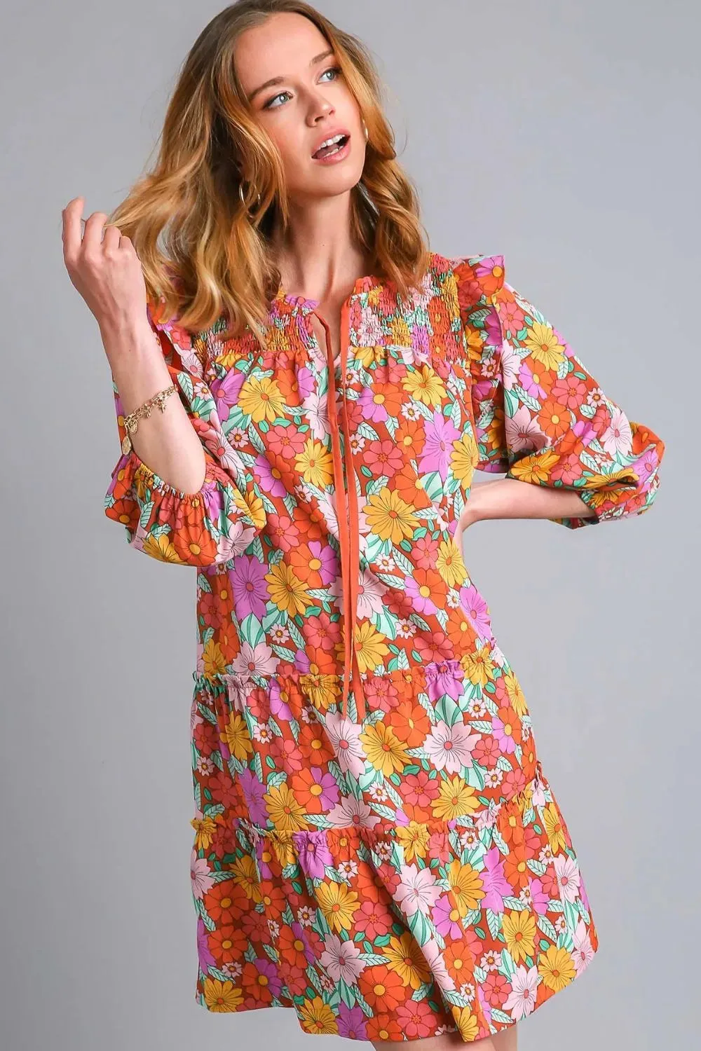 Umgee Full Size Ruffled Flower Print Tie Neck Tiered Dress Plus Size sold by Gigi Laurent