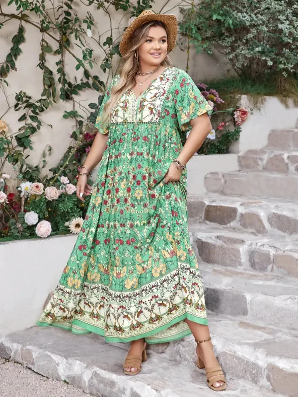 Plus Size Floral Tie Neck Flutter Sleeve Maxi Dress sold by Gigi Laurent