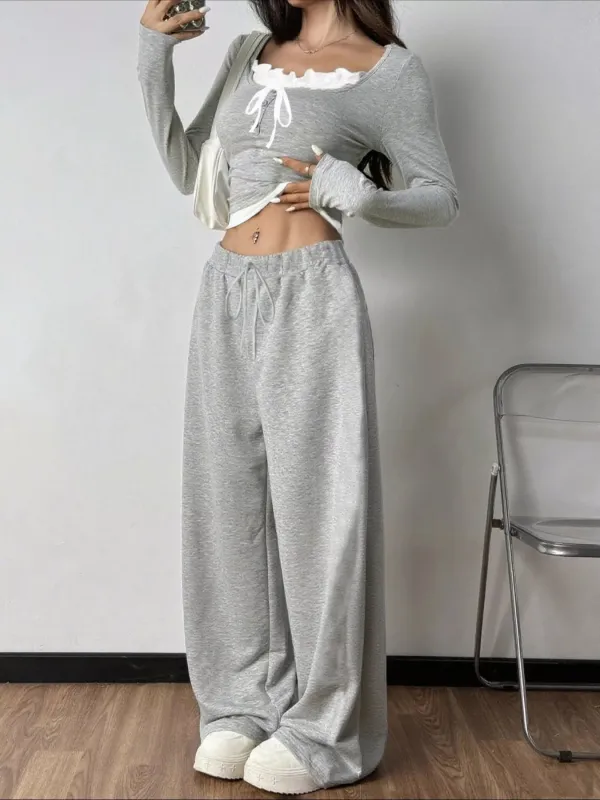 Tied Long Sleeve Top and Pants Set sold by Gigi Laurent