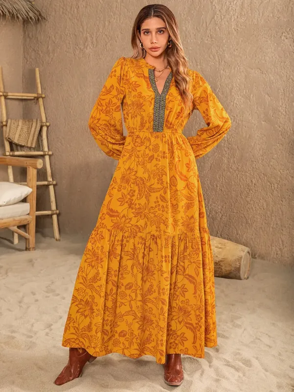 Printed Notched Balloon Sleeve Dress sold by Gigi Laurent