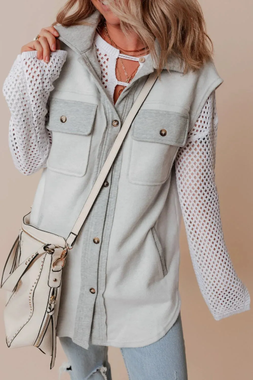 Pocketed Curved Hem Button Up Vest sold by Gigi Laurent
