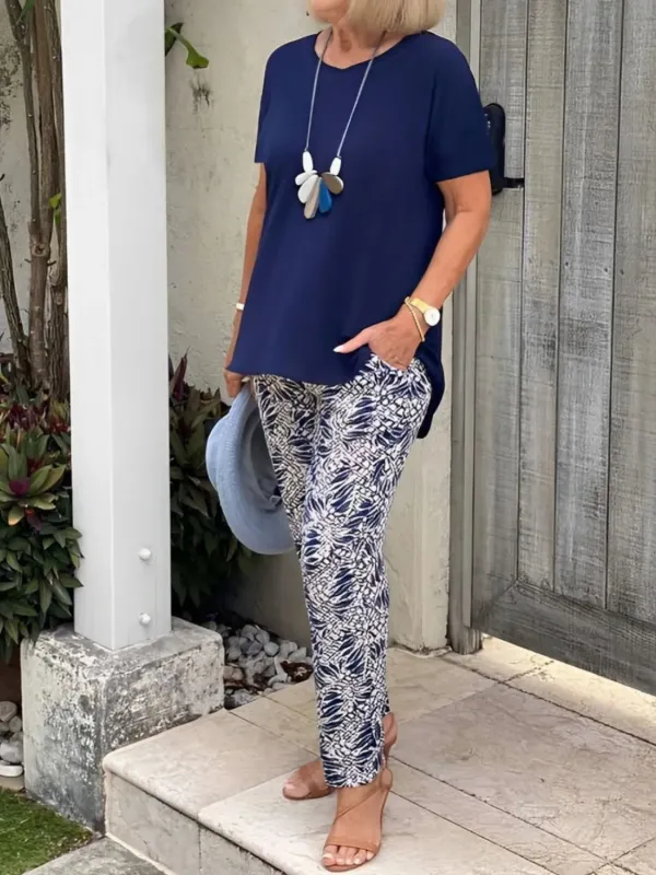 Full Size Round Neck Short Sleeve Top and Pants Set Plus Size made by Trendsi