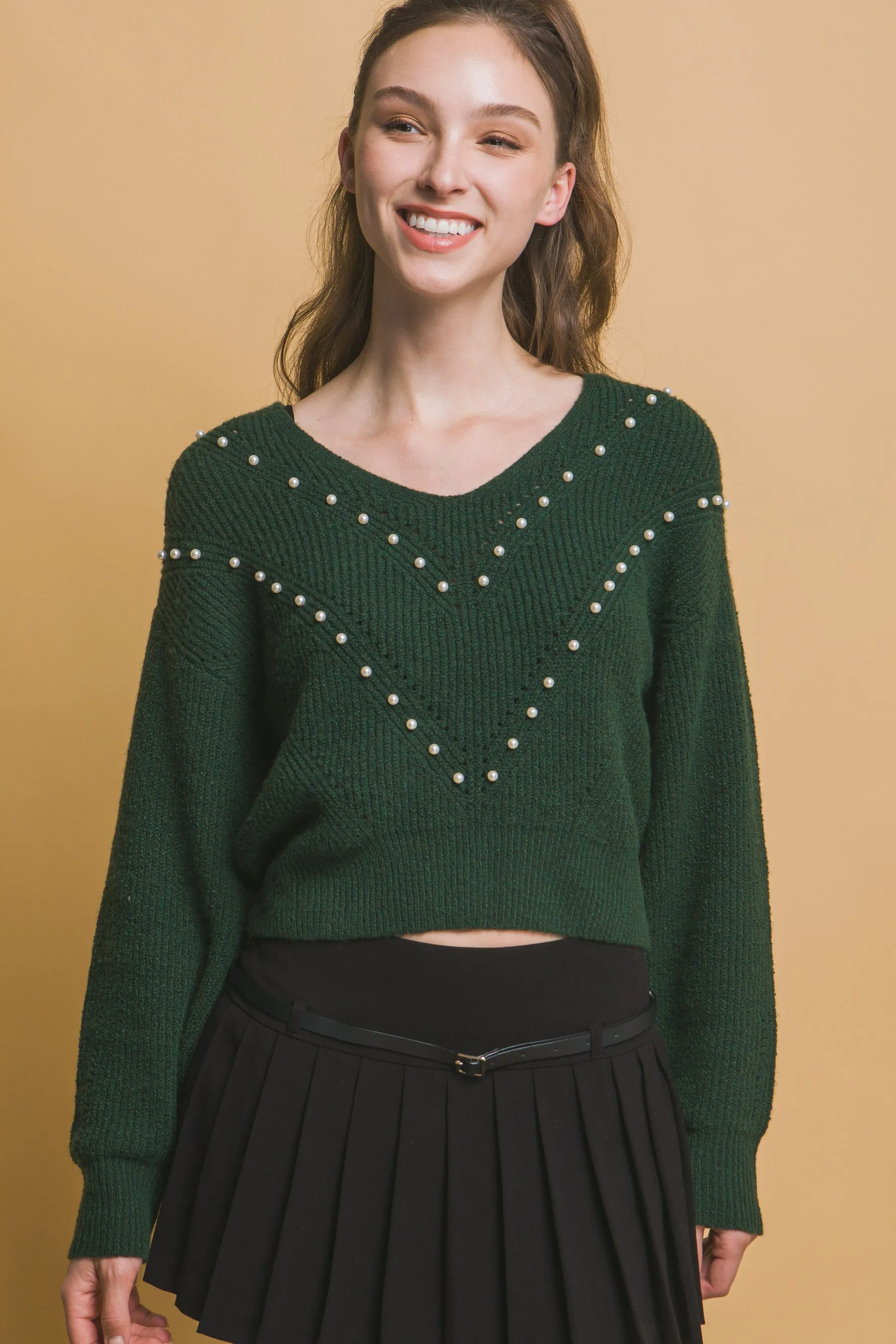 Pearl details sweater sold by Gigi Laurent