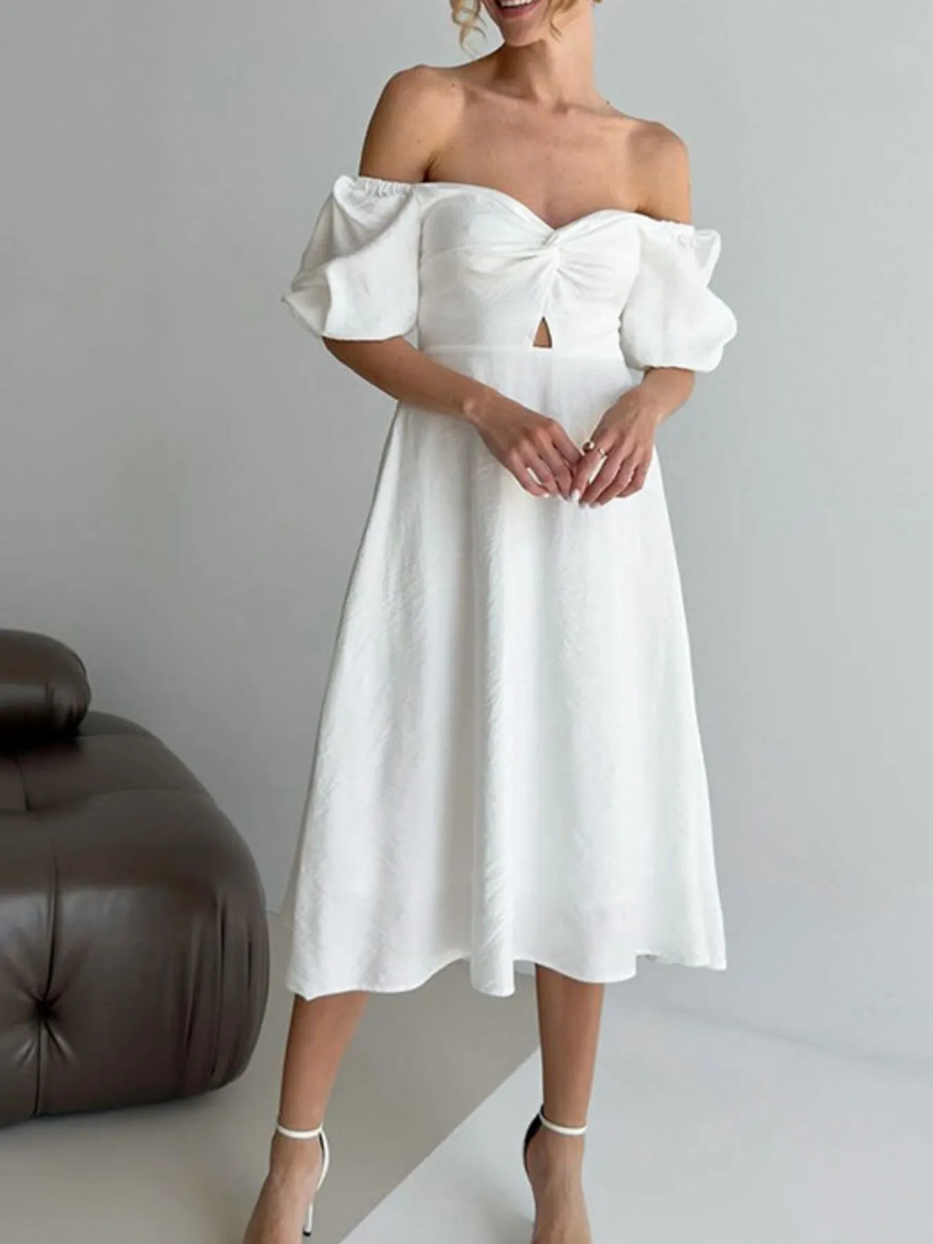 Twisted Front Puff Sleeve Midi Dress sold by Gigi Laurent
