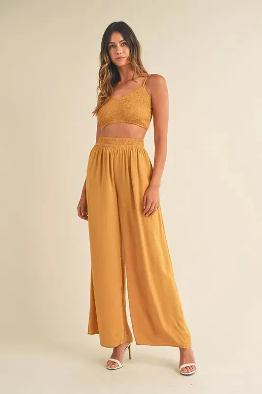 MABLE Smocked Bralette Crop Top and Wide Leg Pants Set made by Trendsi