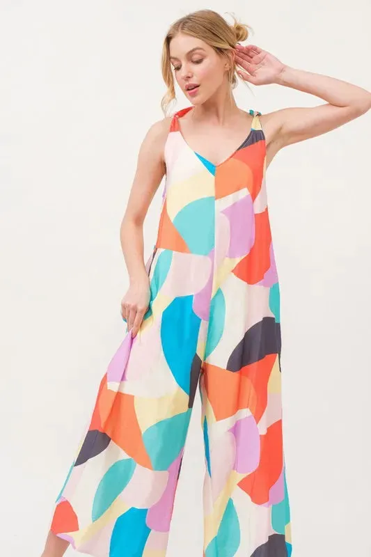 And The Why Tied Shoulder Straps Wide-Leg Geo Print Jumpsuit made by Trendsi