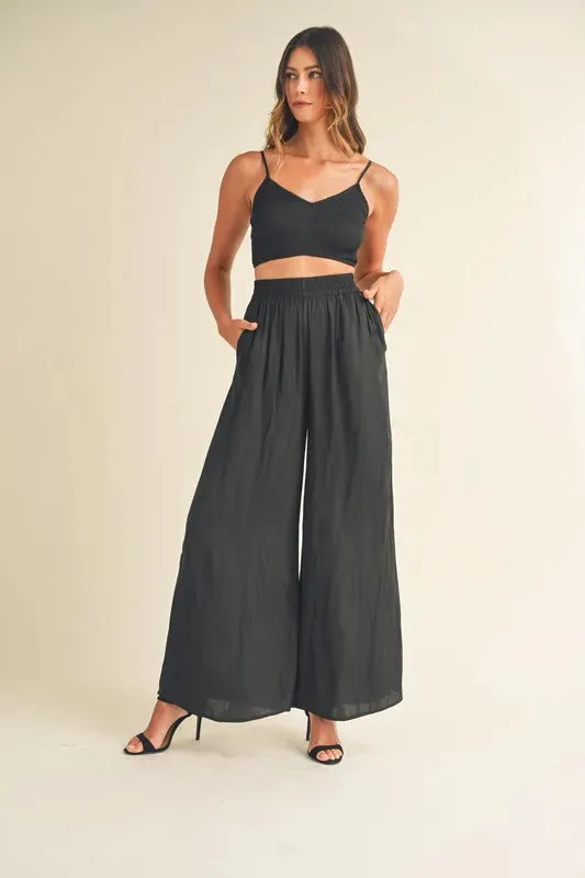 MABLE Smocked Bralette Crop Top and Wide Leg Pants Set made by Trendsi