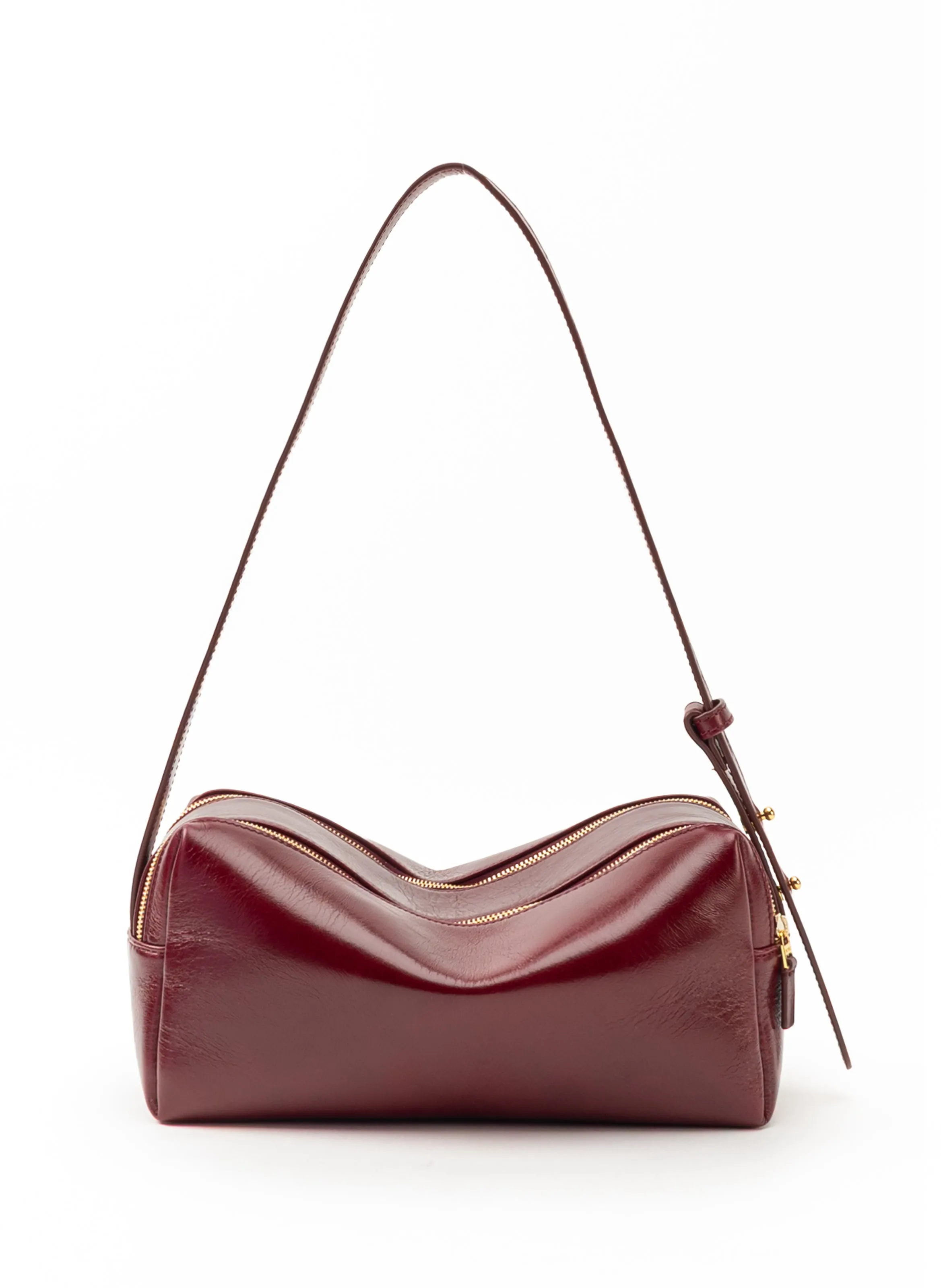 Trousse Vintage Leather Rubino sold by Elleme