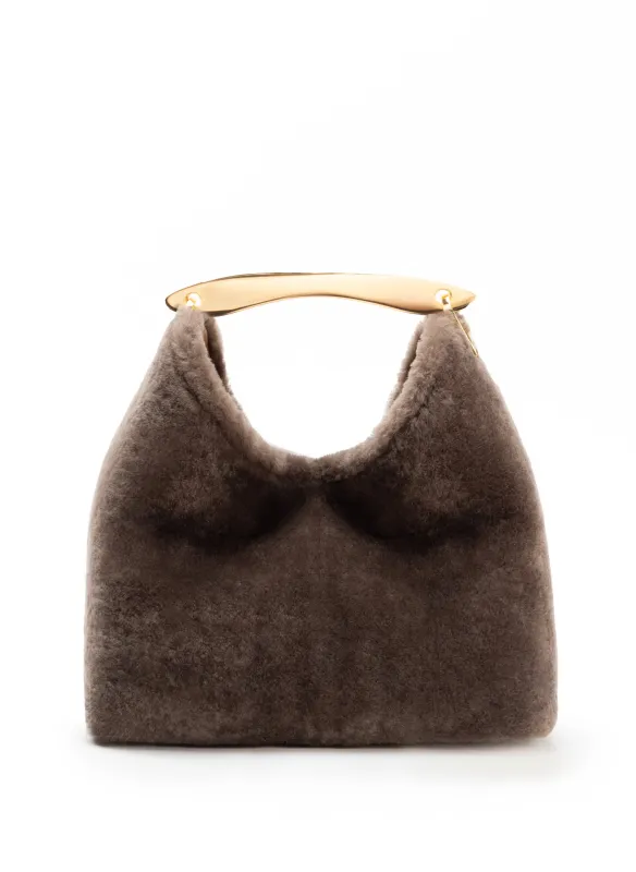 Boomerang Shearling Taupe sold by Elleme