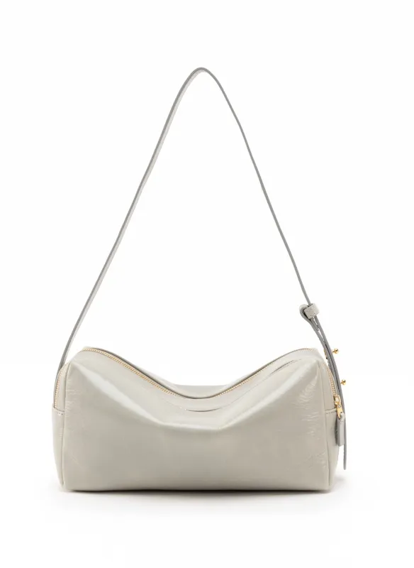 Trousse Vintage Leather Cemento sold by Elleme