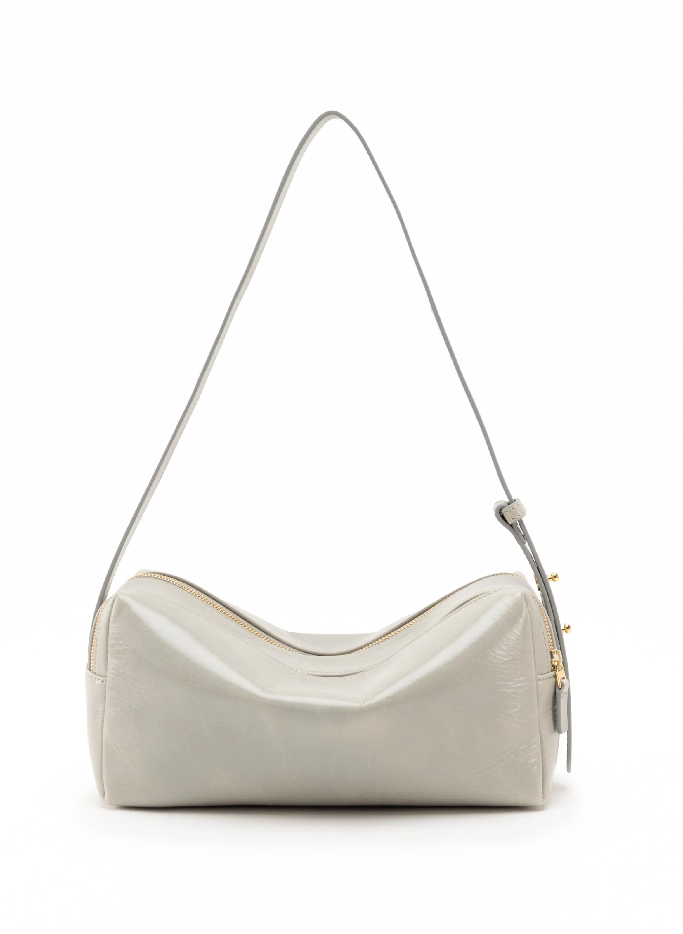 Trousse Vintage Leather Cemento sold by Elleme