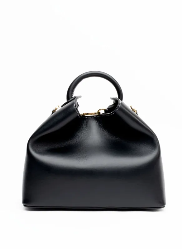 Raisin Leather Black/White Stitches sold by Elleme