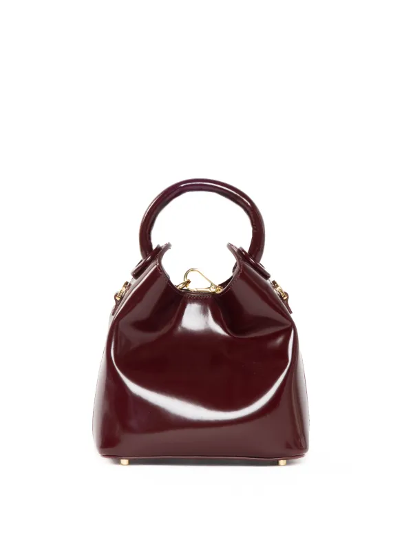 Madeleine Patent Leather Wine sold by Elleme