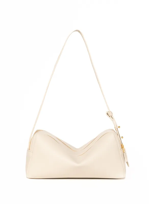 Trousse Pebbled Leather Sesame sold by Elleme