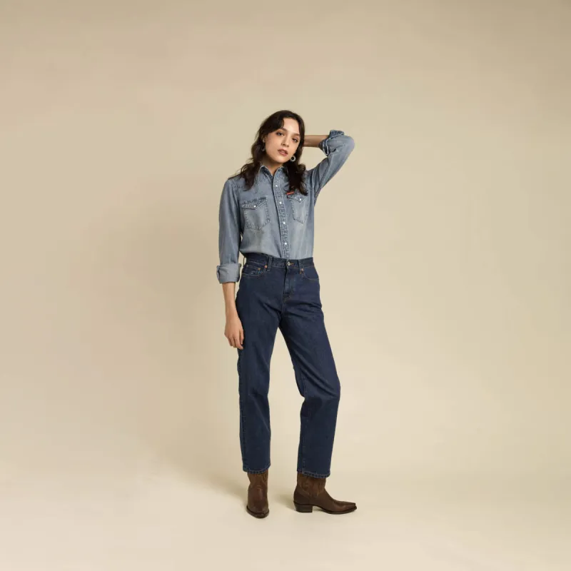 The Women's Wyatt Denim Pearl Snap Shirt made by Sendero Provisions CO