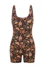 Rhapsody Paros Onesie sold by Kavala Collective