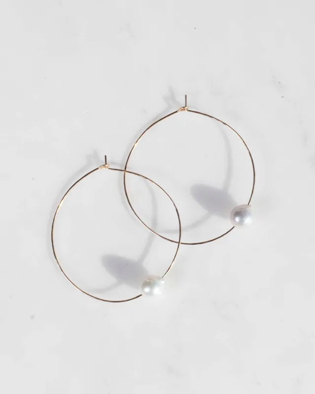 Baroque Pearl Hoops sold by Mary MacGill