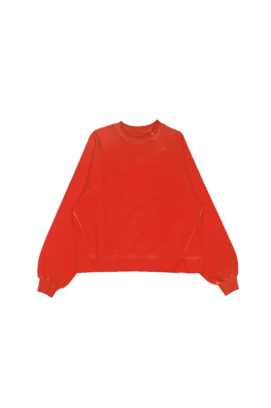 ASYMMETRICAL RAGLAN SWEATER IN RED made by Spencer Badu