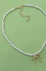 Lucy Bow Necklace sold by Brightside Boutique