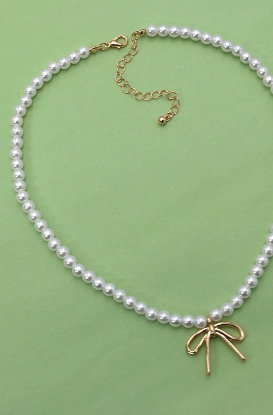 Lucy Bow Necklace sold by Brightside Boutique