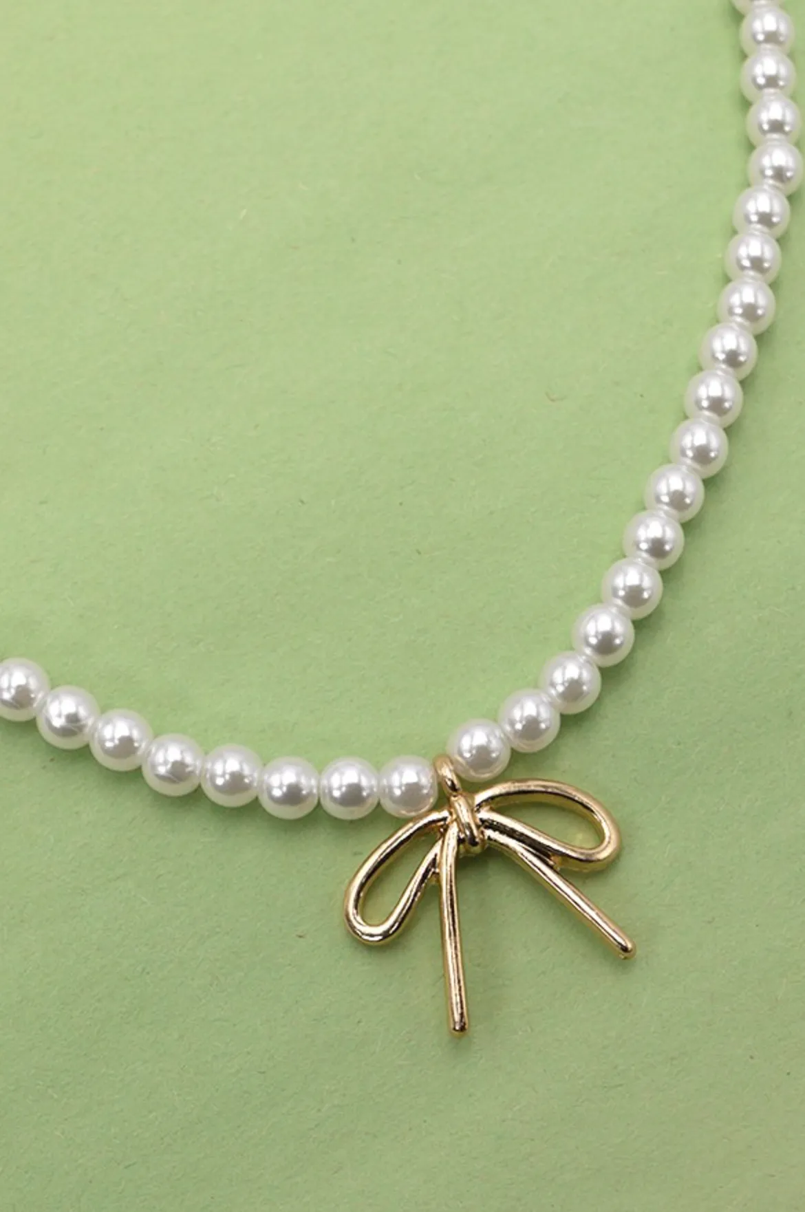 Lucy Bow Necklace sold by Brightside Boutique product image thumbnail 2