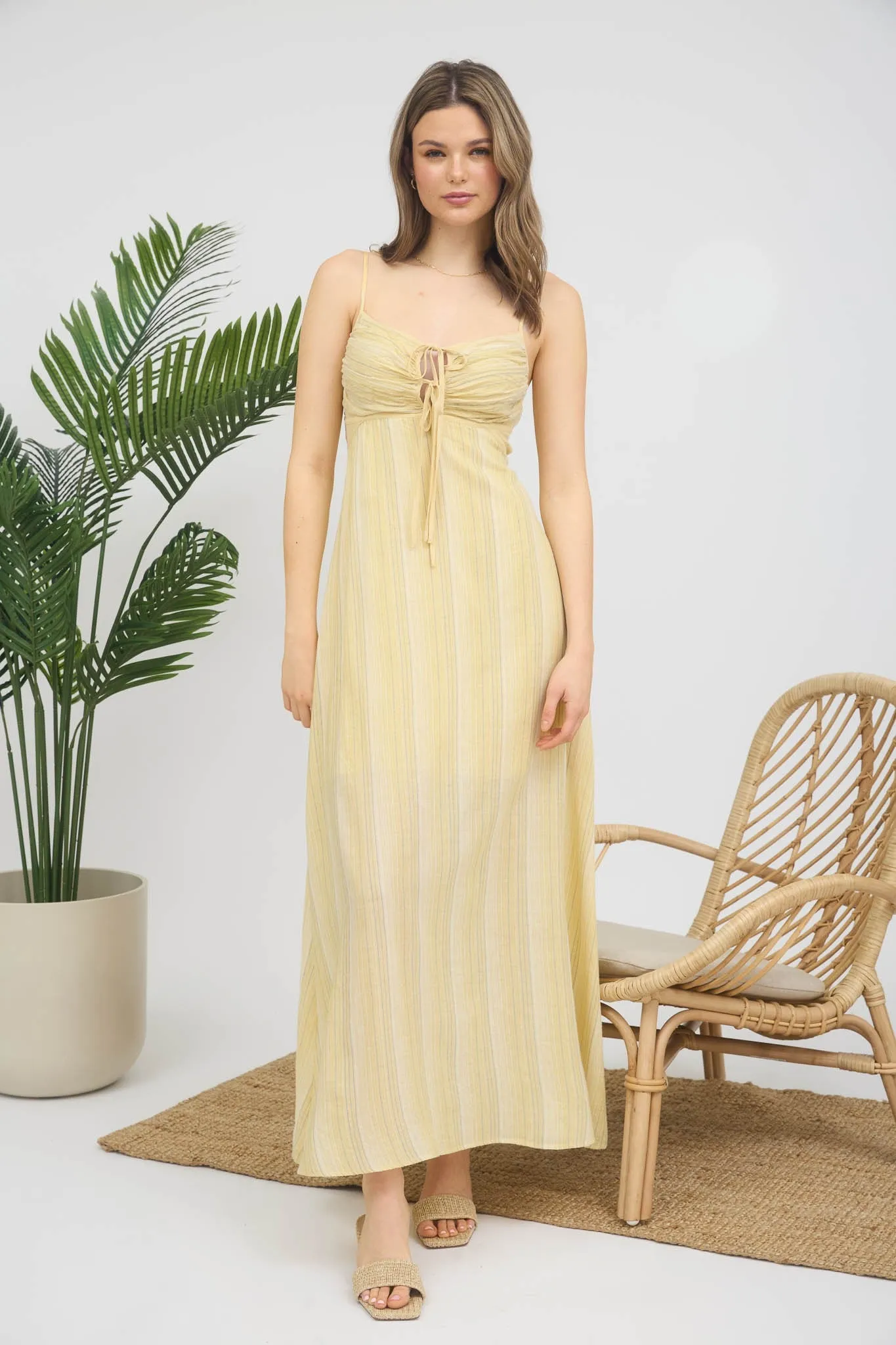 Buttercup Tie Front Maxi Dress sold by Brightside Boutique