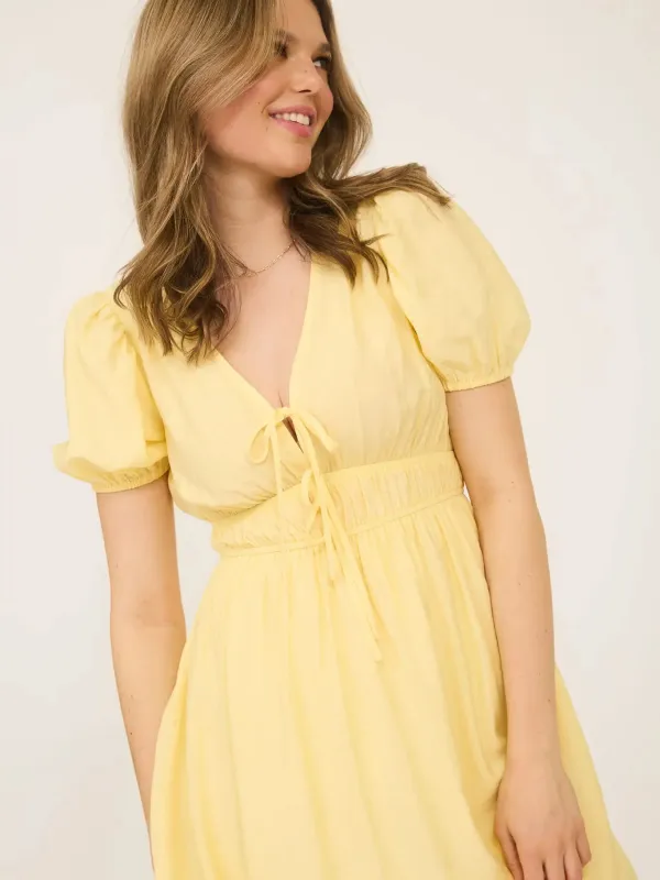 Petal Allure Mini Dress sold by Brightside Boutique