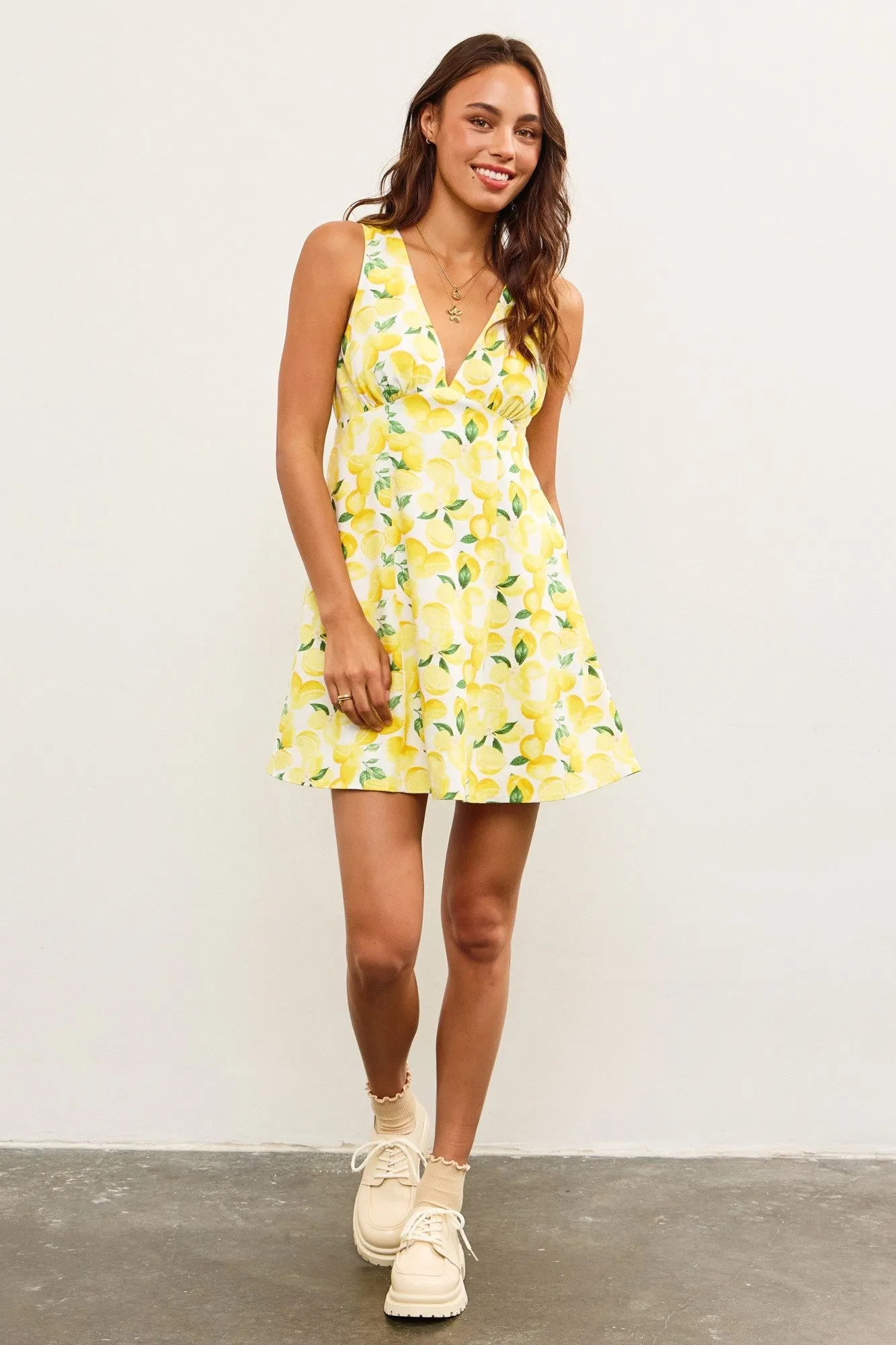 Sunset Spin Mini Dress sold by Brightside Boutique product image thumbnail 5