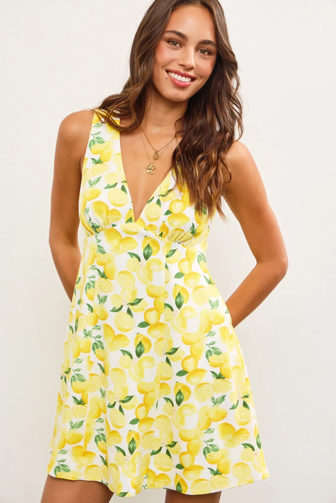 Sunset Spin Mini Dress sold by Brightside Boutique