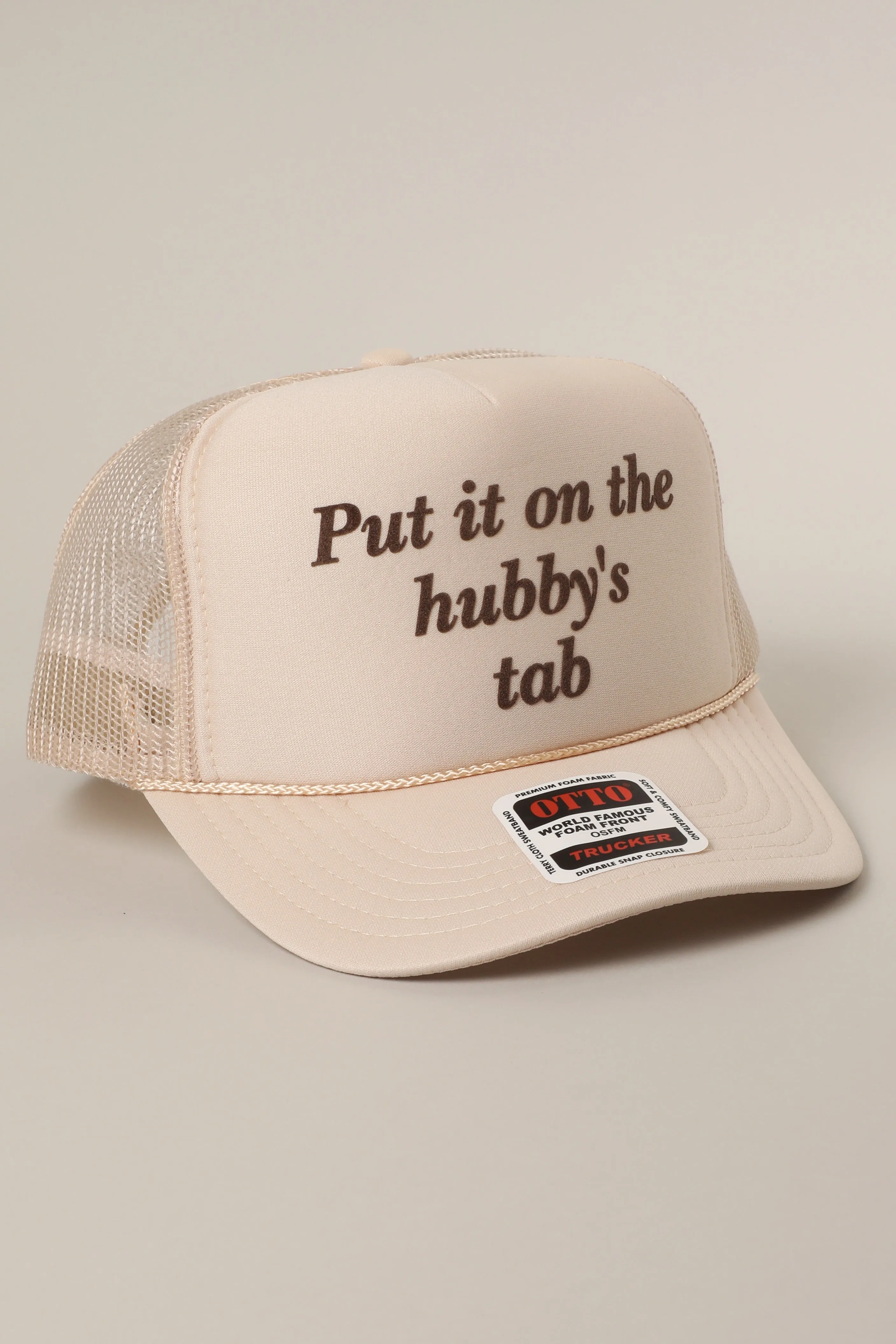 Put It On The Hubby's Tab Trucker Hat sold by Brightside Boutique