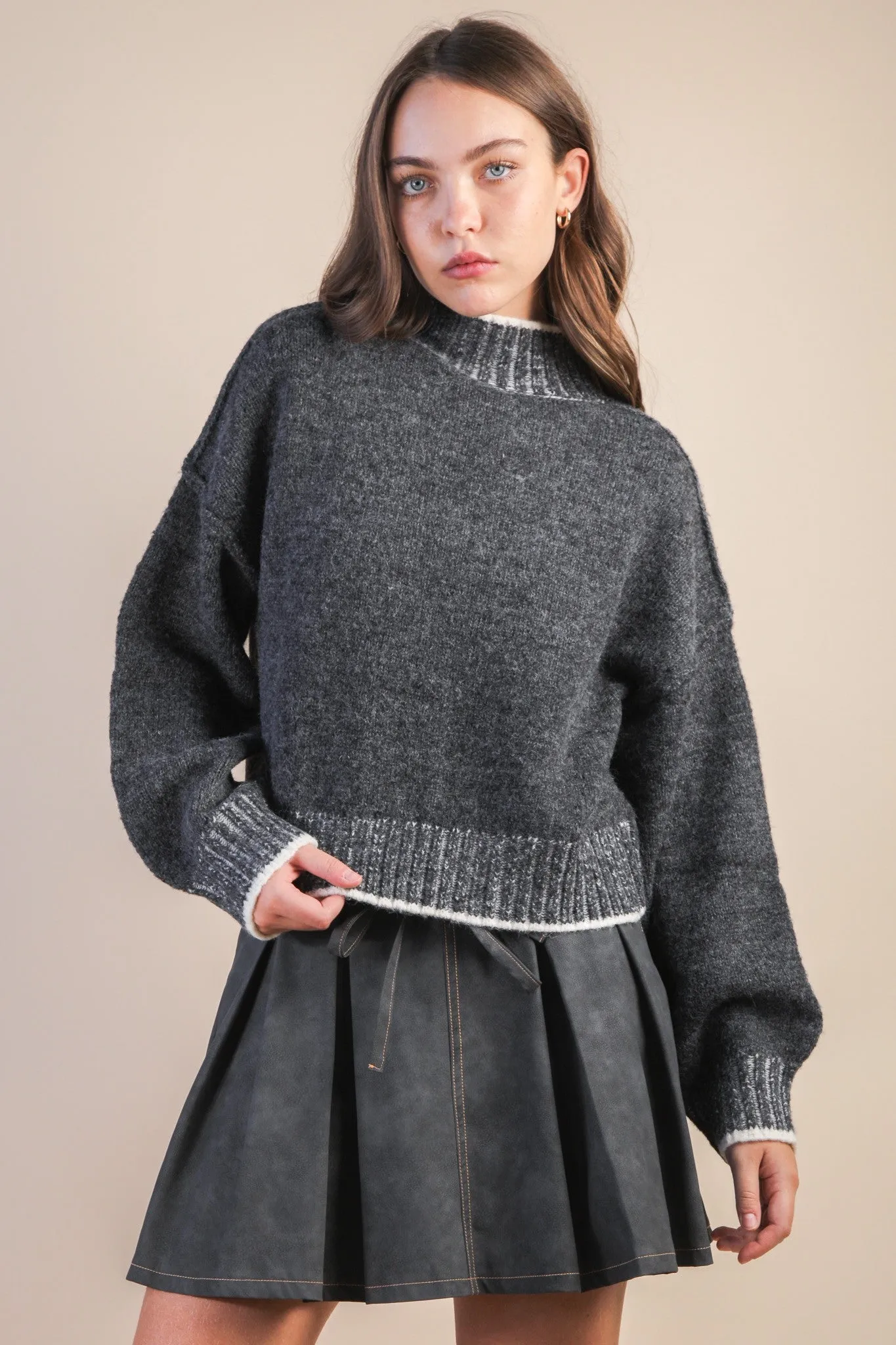 The Warm Brew Mock Neck Sweater sold by Brightside Boutique
