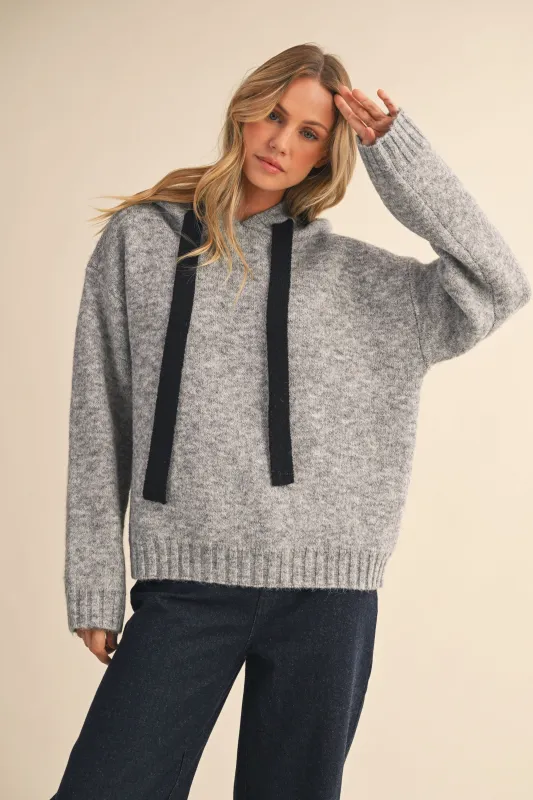 The Mono Tied Hooded Sweater sold by Brightside Boutique