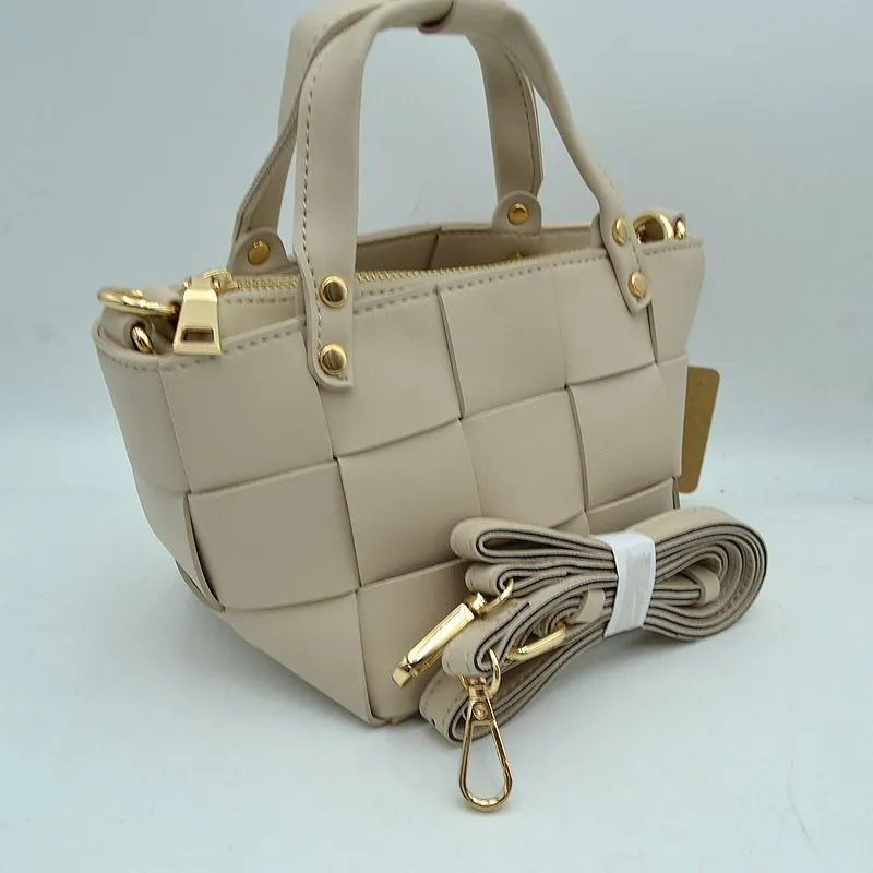The Easton Woven Leather Bag sold by Brightside Boutique
