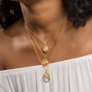 Dreamchaser Gold Spinning Necklace sold by Wanderlust and Co