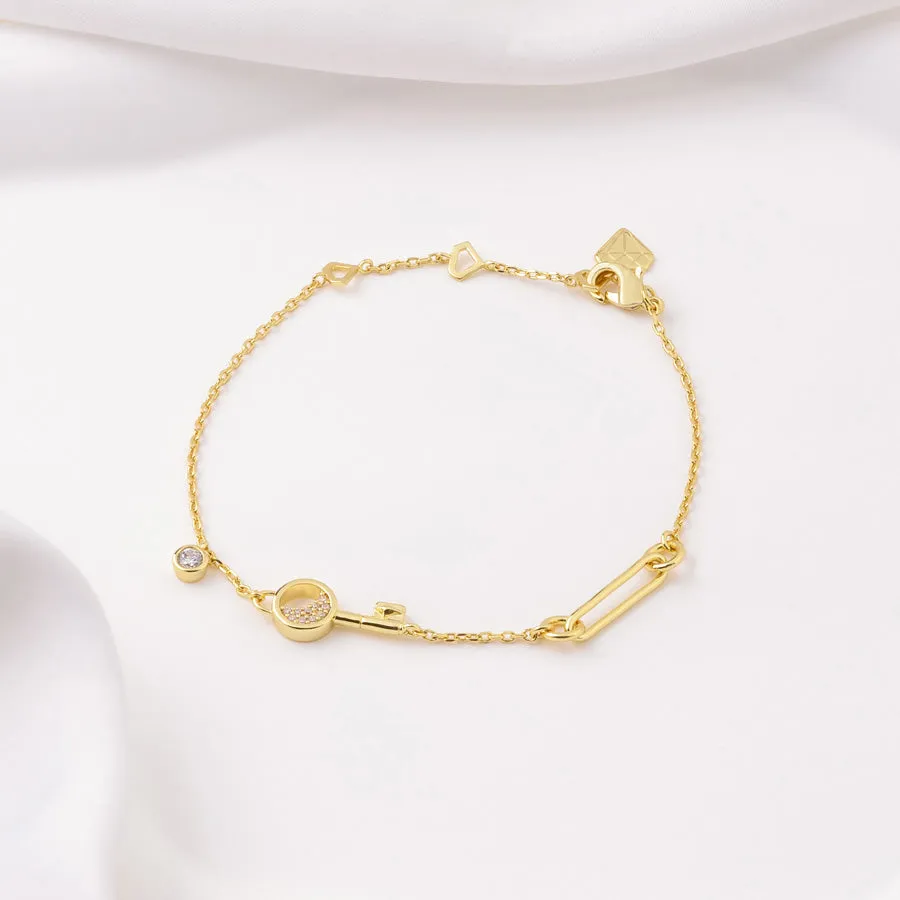 Crescent Key Gold Bracelet sold by Wanderlust and Co