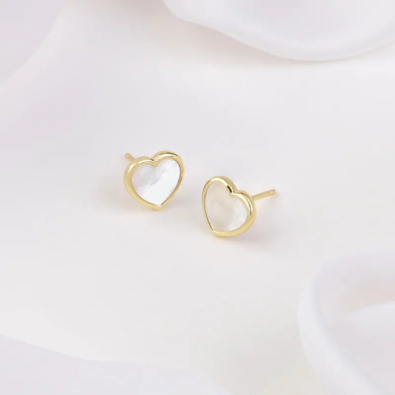 Heart Pearl & Gold Stud Earrings sold by Wanderlust and Co