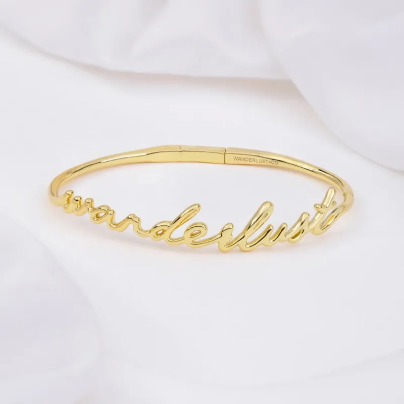 Wanderlust Gold Bangle sold by Wanderlust and Co