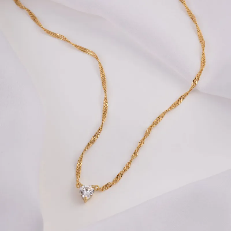 Heart Gold Necklace sold by Wanderlust and Co