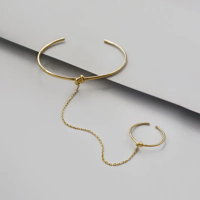 Infinity Knot 14K Gold Vermeil Hand Chain sold by Wanderlust and Co