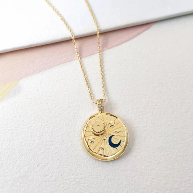 Spinning Sun Navy & Gold Necklace sold by Wanderlust and Co