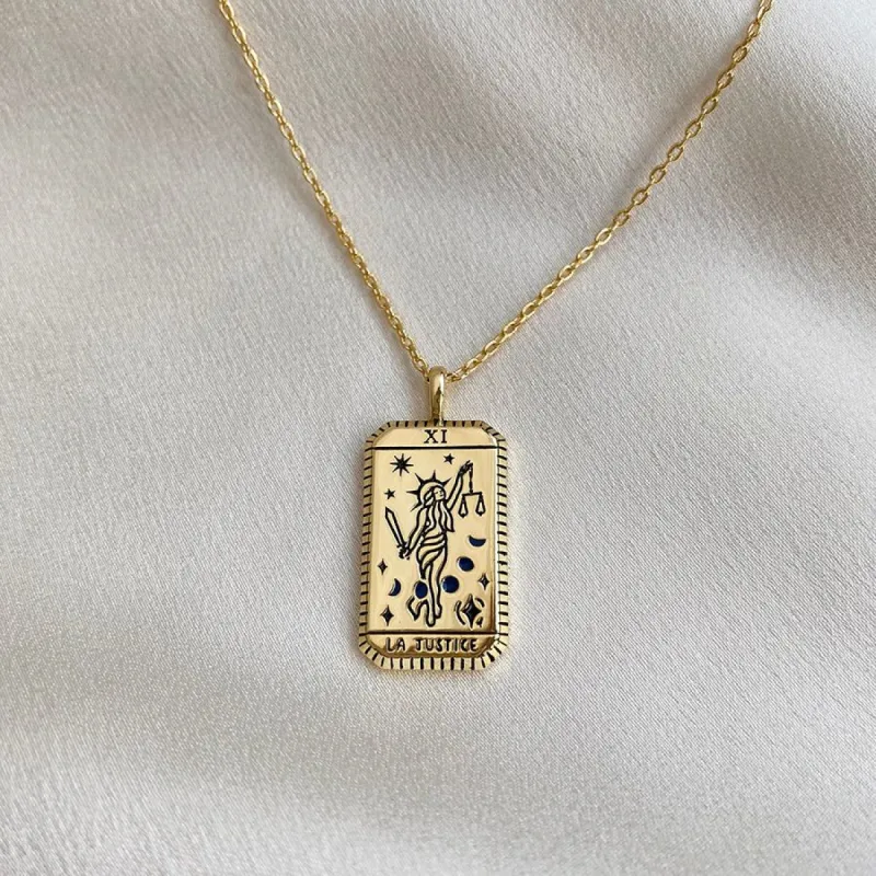 La Justice Gold Tarot Necklace sold by Wanderlust and Co