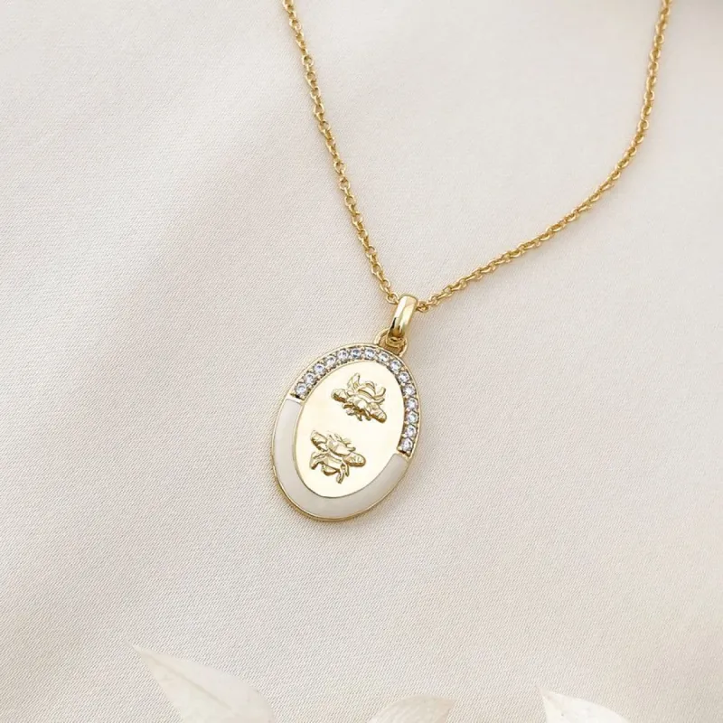 Bee Pave Ivory & Gold Necklace sold by Wanderlust and Co