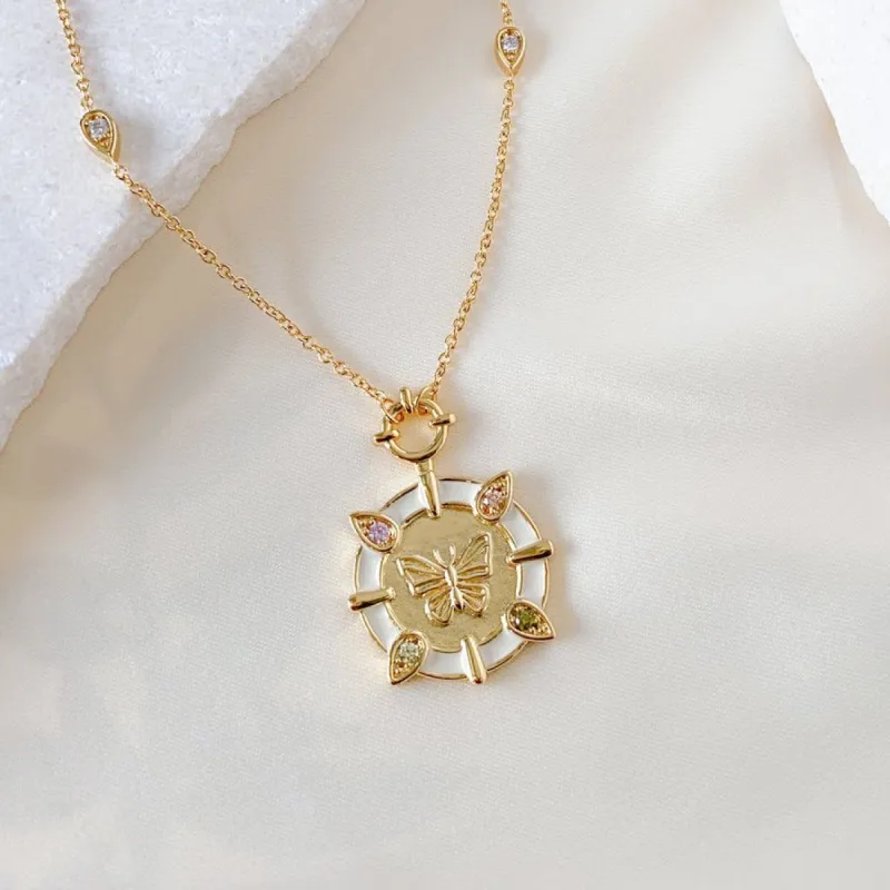 Butterfly Ivory & Gold Necklace sold by Wanderlust and Co