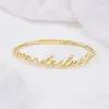 Wanderlust Gold Bangle sold by Wanderlust and Co