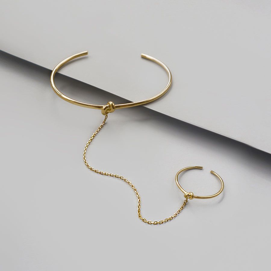 Infinity Knot 14K Gold Vermeil Hand Chain sold by Wanderlust and Co