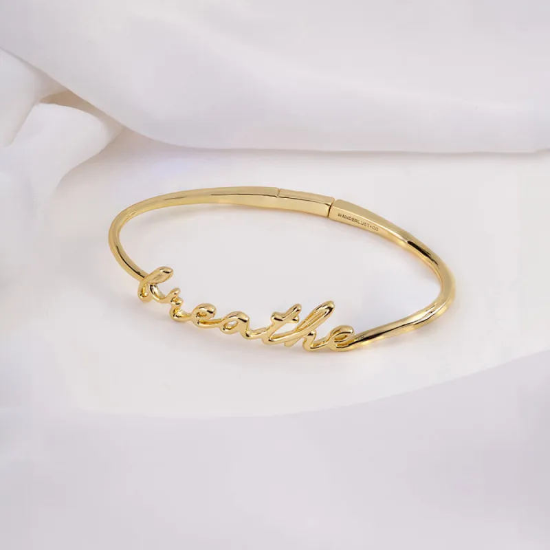 Breathe Gold Bangle sold by Wanderlust and Co