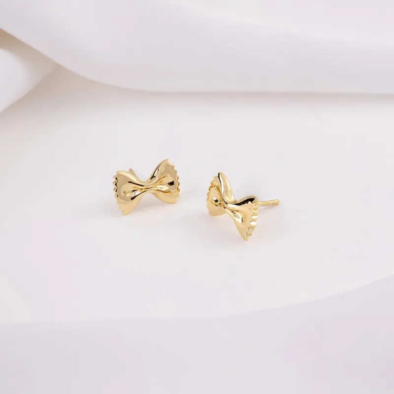 Bow Tie Pasta Gold Stud Earrings sold by Wanderlust and Co