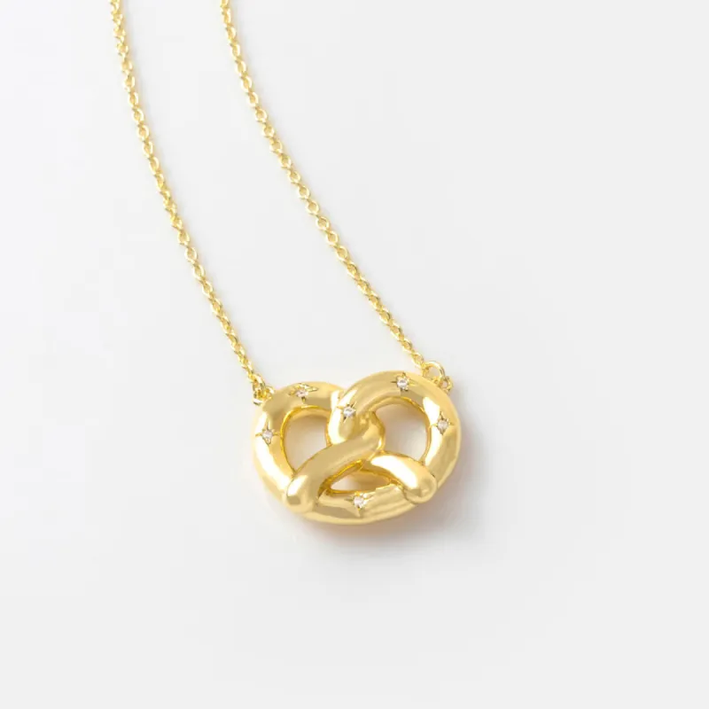 Pretzel Gold Necklace sold by Wanderlust and Co
