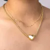 Bubble Heart Gold Locket Pendant sold by Wanderlust and Co