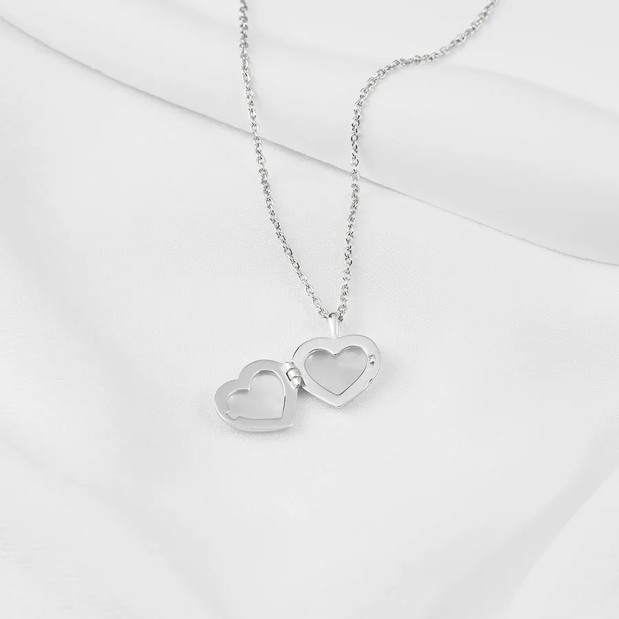 Heart Pearl & Silver Locket Necklace sold by Wanderlust and Co product image thumbnail 2